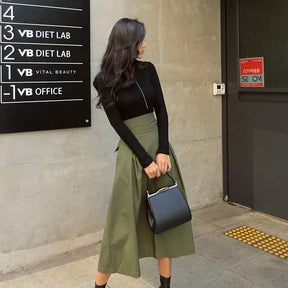 Charlotte – Stijlvolle Hoge Taille A-Lijn Midi-Rok met Strikdetail