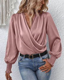 Clara – Vloeiende Wikkelblouse met Ballonmouwen