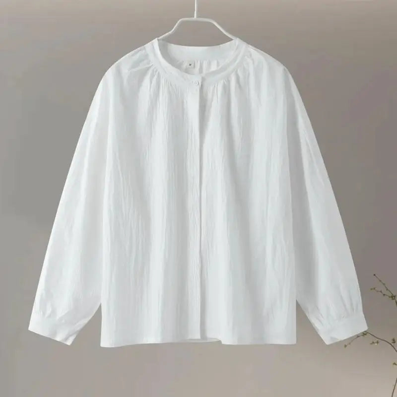 Eléa – Elegante vloeiende blouse met pofmouwen