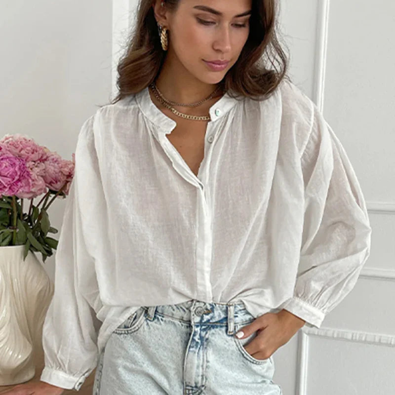 Eléa – Elegante vloeiende blouse met pofmouwen