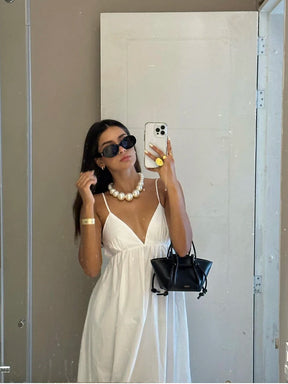 Sienna - Zomerse Witte Maxi Jurk met Open Rug en Spaghettibandjes