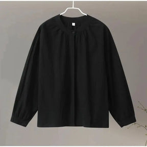 Eléa – Elegante vloeiende blouse met pofmouwen