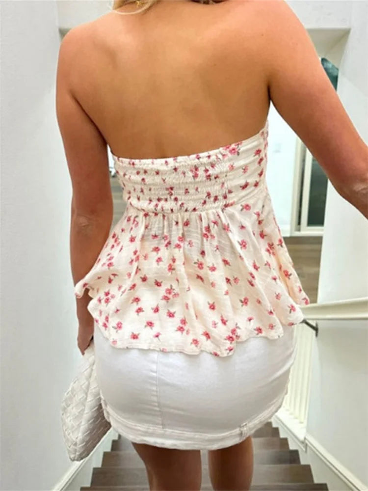 Emma - Luchtige bustier top met bloemenprint en strik aan de voorkant